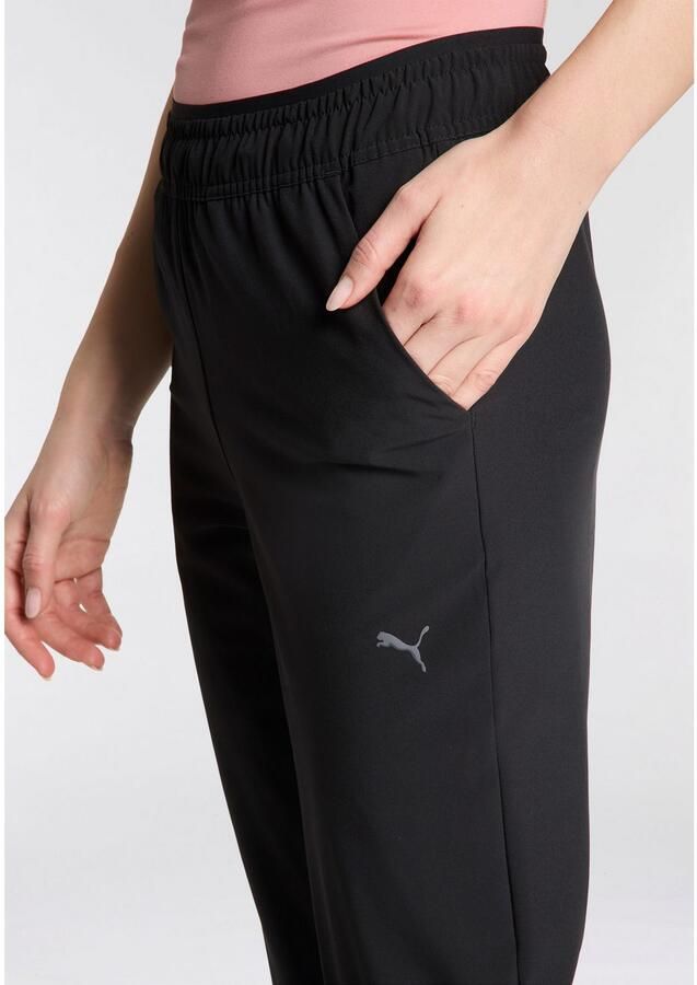 PUMA Trainingsbroek MOVE FASHION PANT losse snit perfect voor de studio en yoga