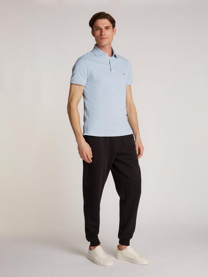 Tommy Hilfiger Poloshirt 1985 SLIM POLO met piquéstructuur en borduursel gemêleerd casual slim fit katoenmix polokraag - Foto 11