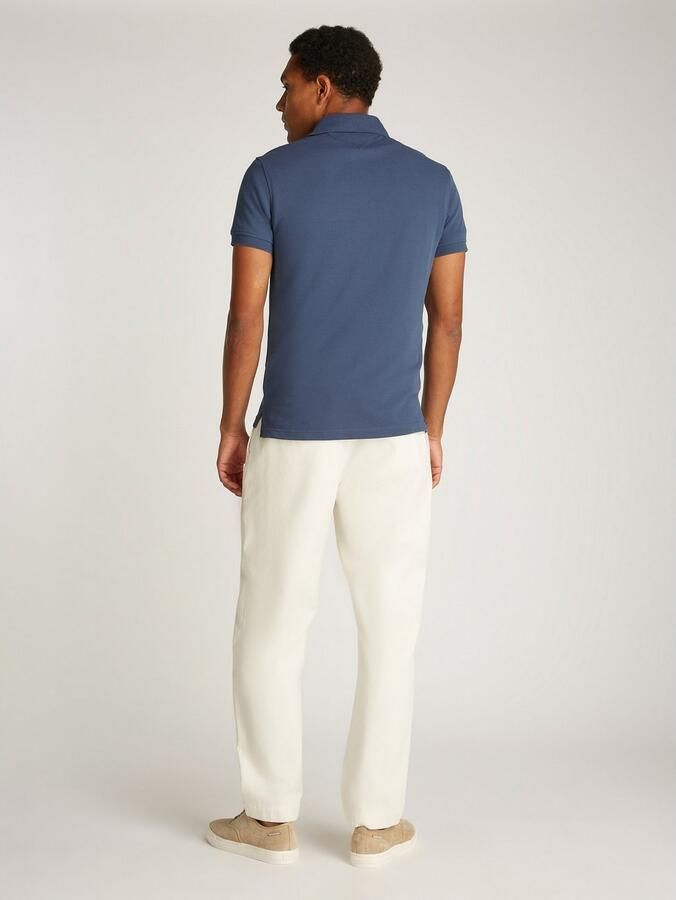 Tommy Hilfiger Poloshirt 1985 SLIM POLO met piquéstructuur en borduursel gemêleerd casual slim fit katoenmix polokraag - Foto 10