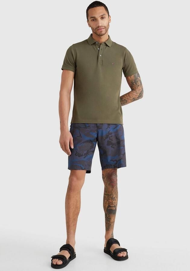 Tommy Hilfiger Poloshirt 1985 SLIM POLO met piquéstructuur en borduursel gemêleerd casual slim fit katoenmix polokraag - Foto 19