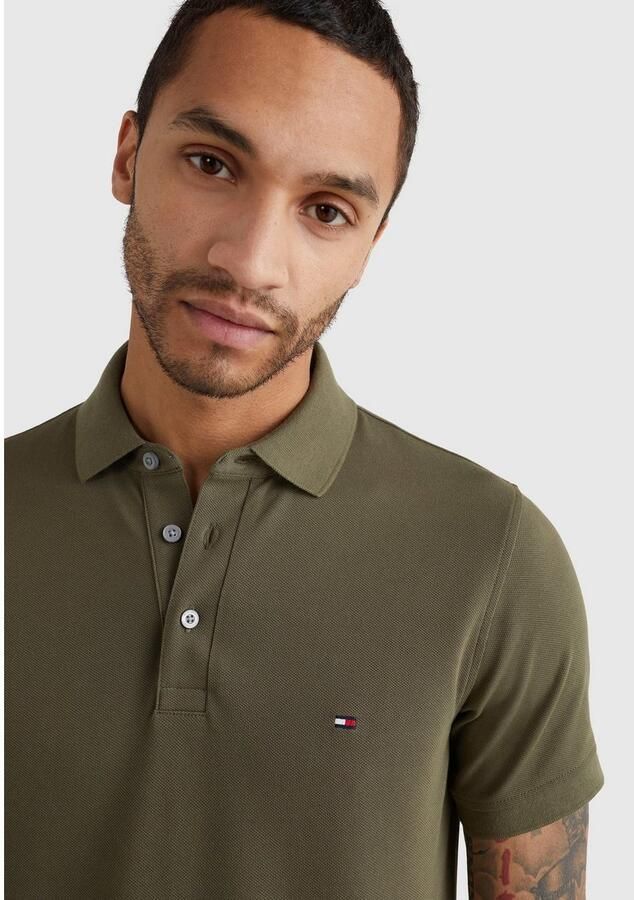 Tommy Hilfiger Poloshirt 1985 SLIM POLO met piquéstructuur en borduursel gemêleerd casual slim fit katoenmix polokraag - Foto 17