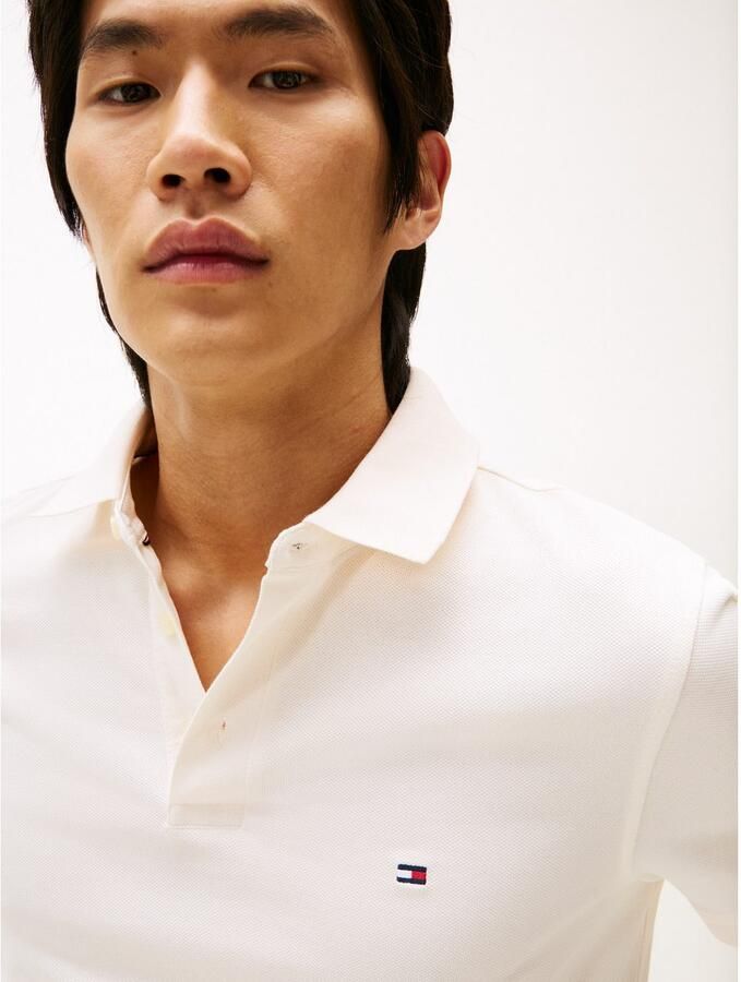 Tommy Hilfiger Poloshirt 1985 SLIM POLO met piquéstructuur en borduursel gemêleerd casual slim fit katoenmix polokraag - Foto 4