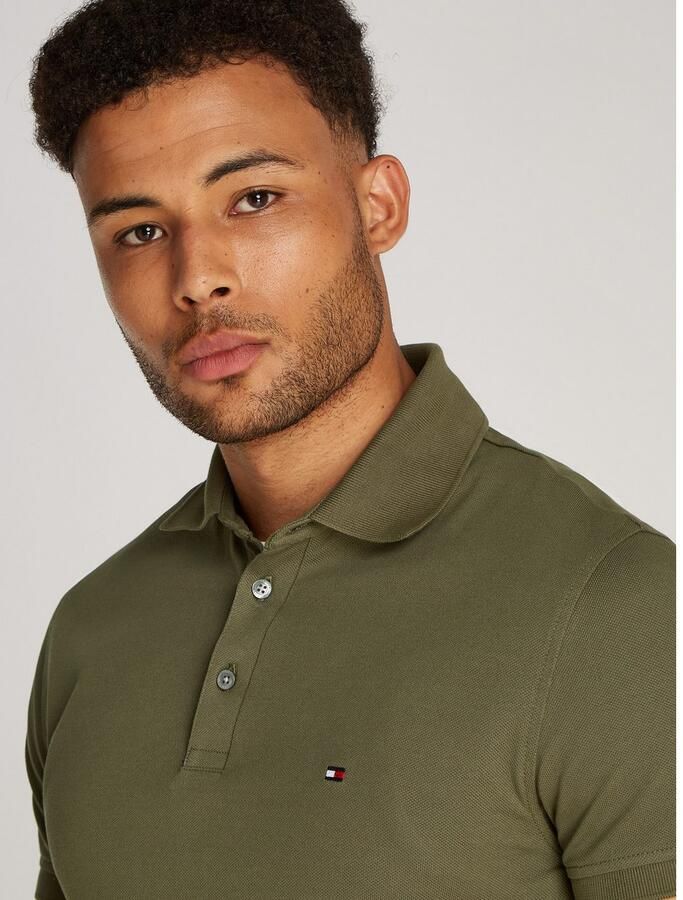 Tommy Hilfiger Poloshirt 1985 SLIM POLO met piquéstructuur en borduursel gemêleerd casual slim fit katoenmix polokraag - Foto 4