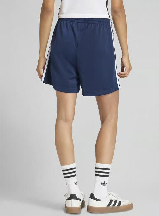 Adidas Originals Loose fit sweatbroek met contraststrepen - Foto 5