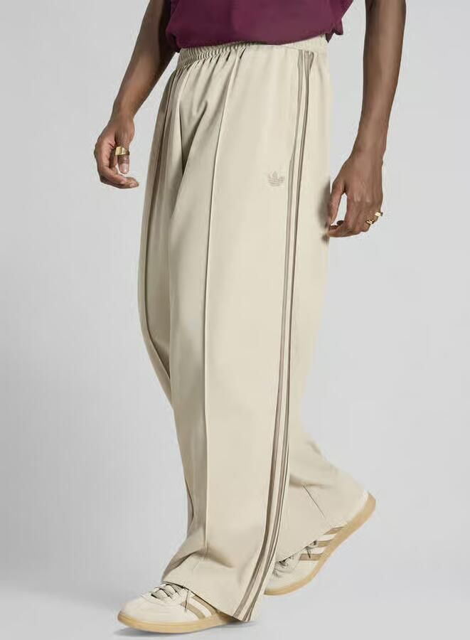 Adidas Originals Loose fit sweatbroek van katoenmix met persplooien - Foto 3