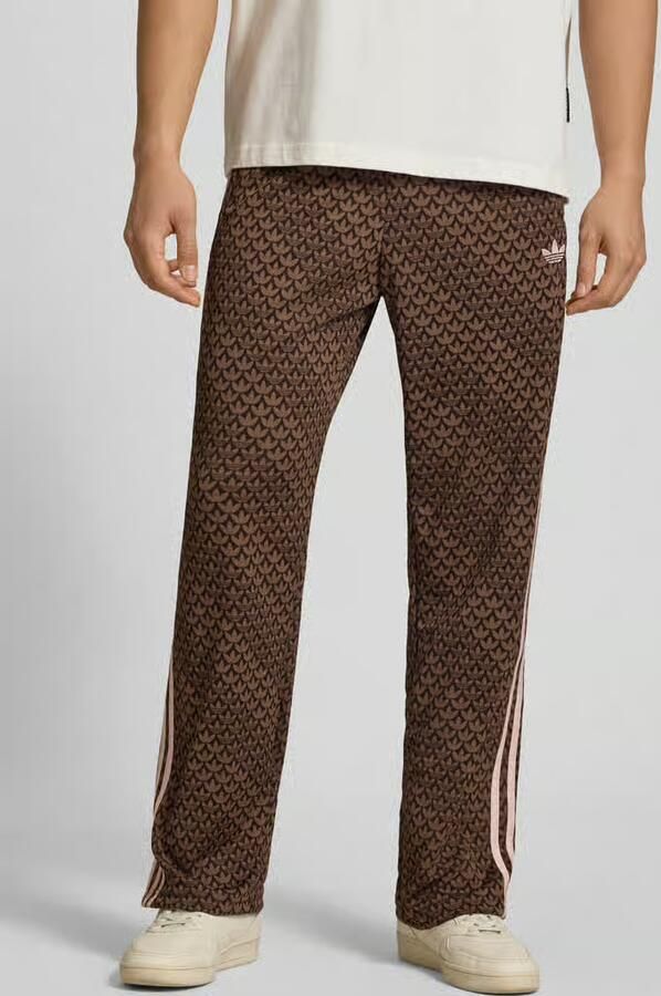Adidas Originals loose fit sweatpants met logomotief model 'FIREBIRD' - Foto 4