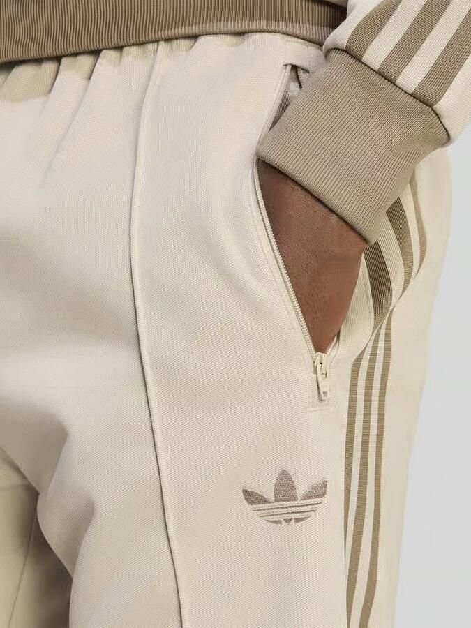 Adidas Originals Slim fit joggingbroek van katoenmix met persplooien