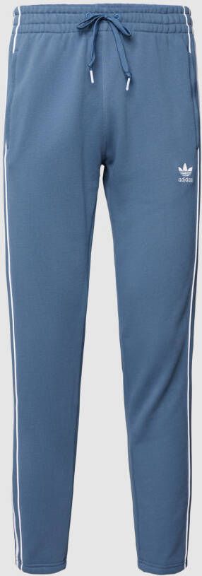 Adidas Originals Regular fit sweatpants met logostrepen
