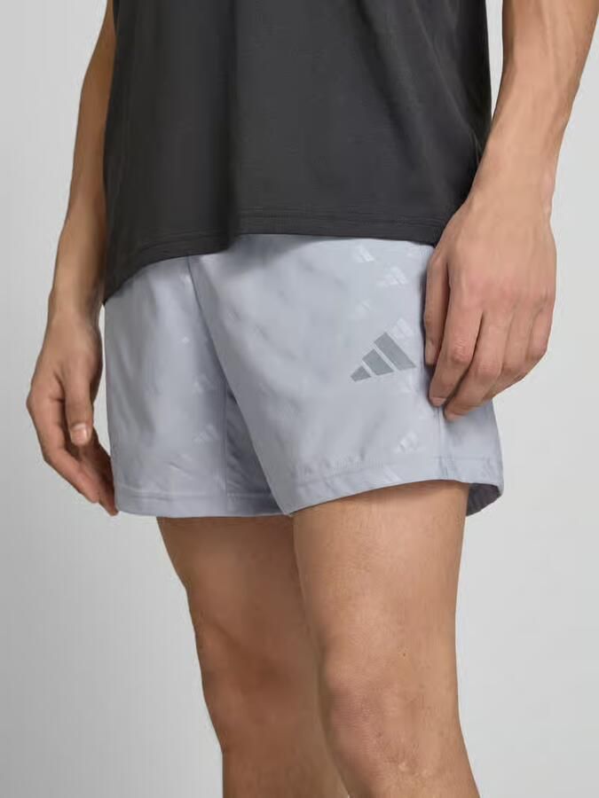 Adidas Training regular fit short met all-over logomotief model 'WE BRLO SHO'