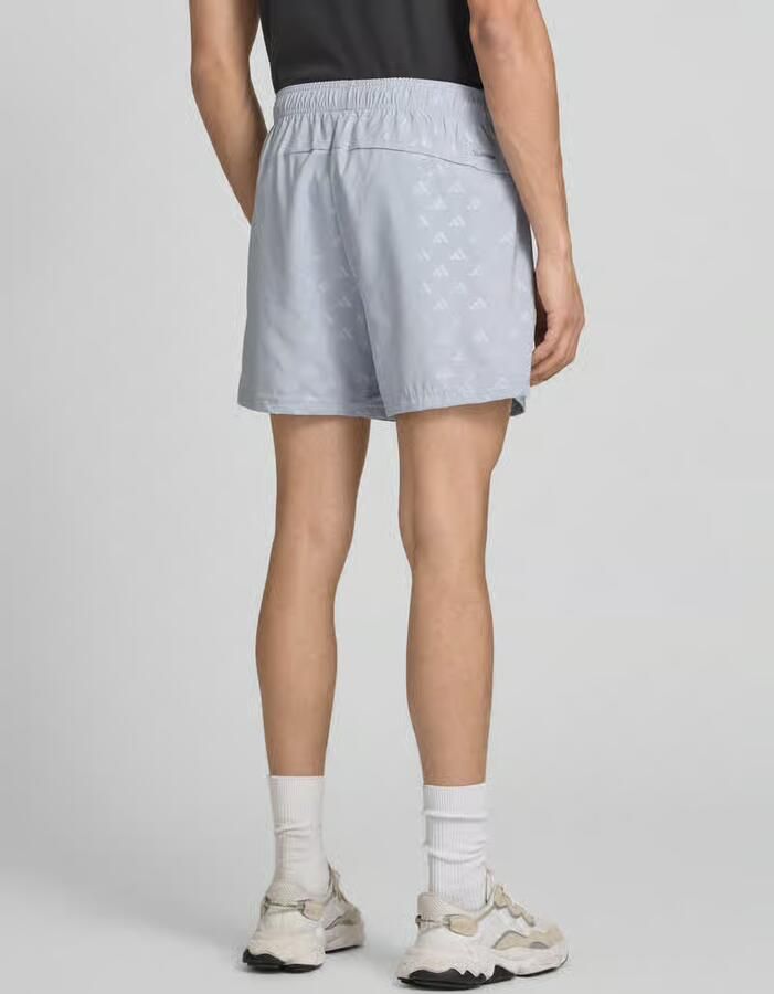 Adidas Training regular fit short met all-over logomotief model 'WE BRLO SHO'