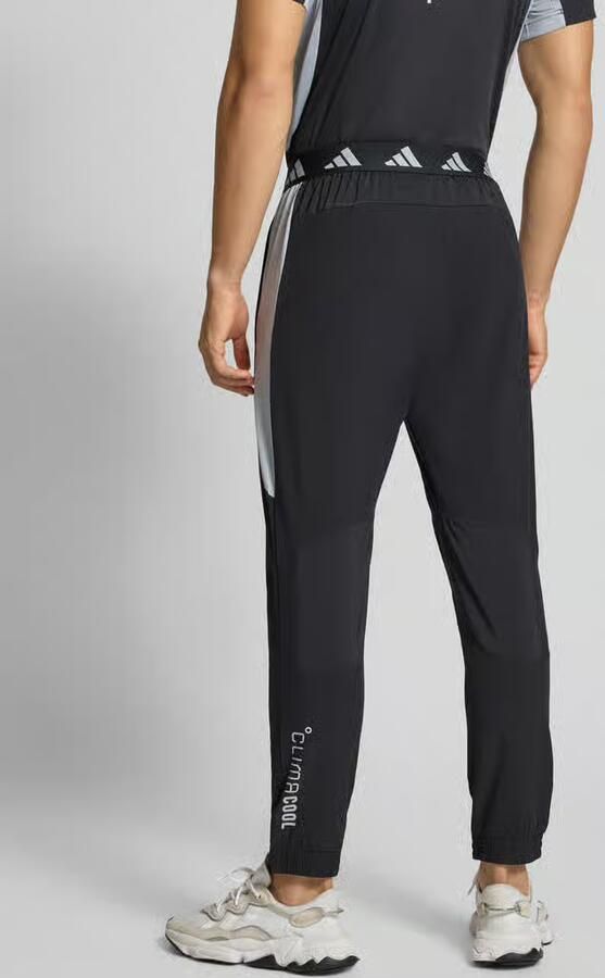 Adidas Training Slim fit trainingsbroek met logoprint model 'Tech' - Foto 8