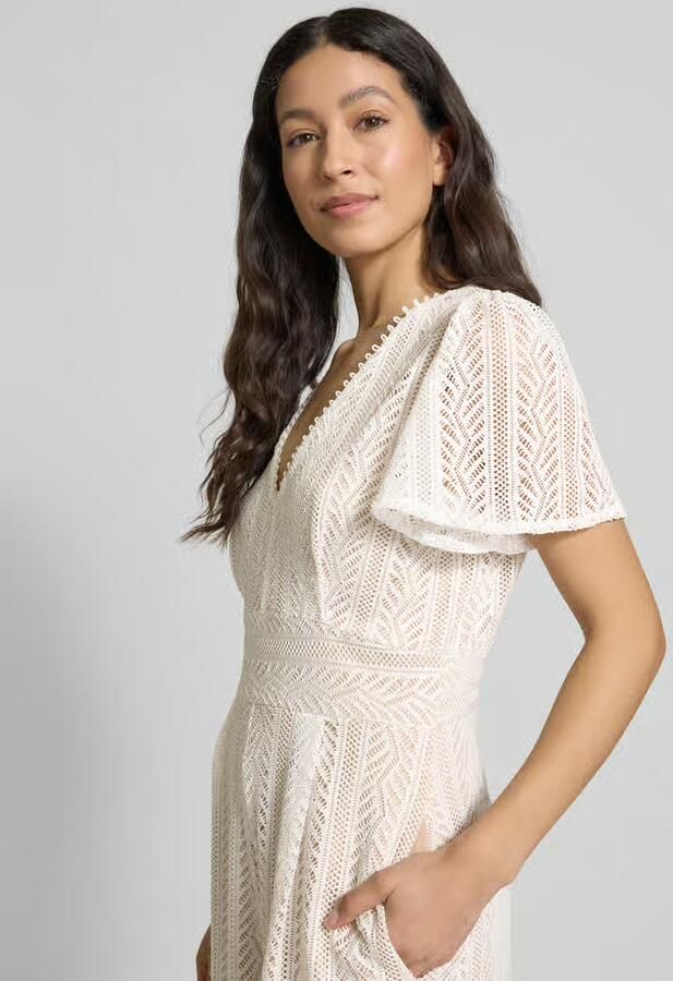 Apricot Jumpsuit met Ajourwerk en rugzijde Ritssluiting