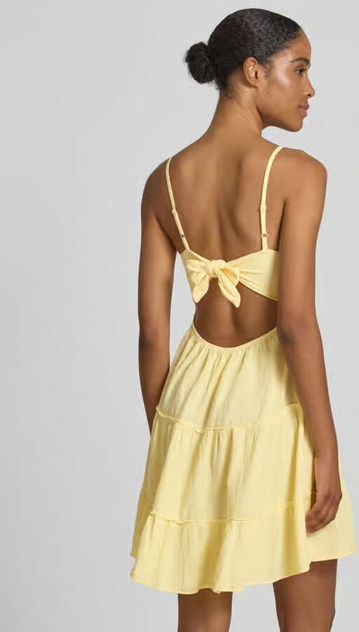 Apricot mini-jurk met cut-out op de rug - Foto 4