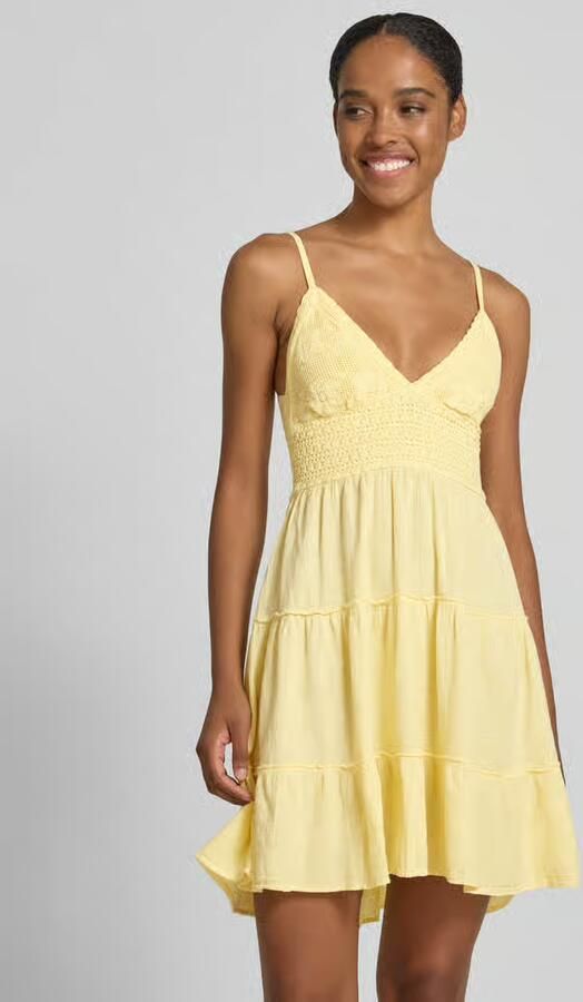 Apricot mini-jurk met cut-out op de rug - Foto 3