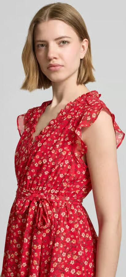 Apricot Minijurk met een all-over bloemenprint
