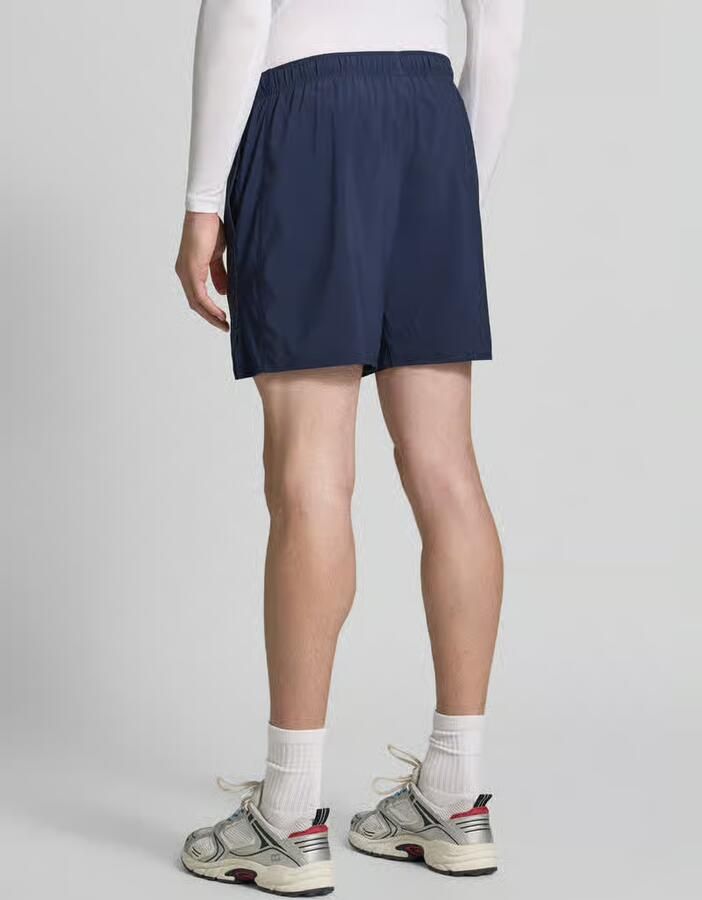 ASICS Regular Fit korte broek met geïntegreerde slip model 'ICON' - Foto 2