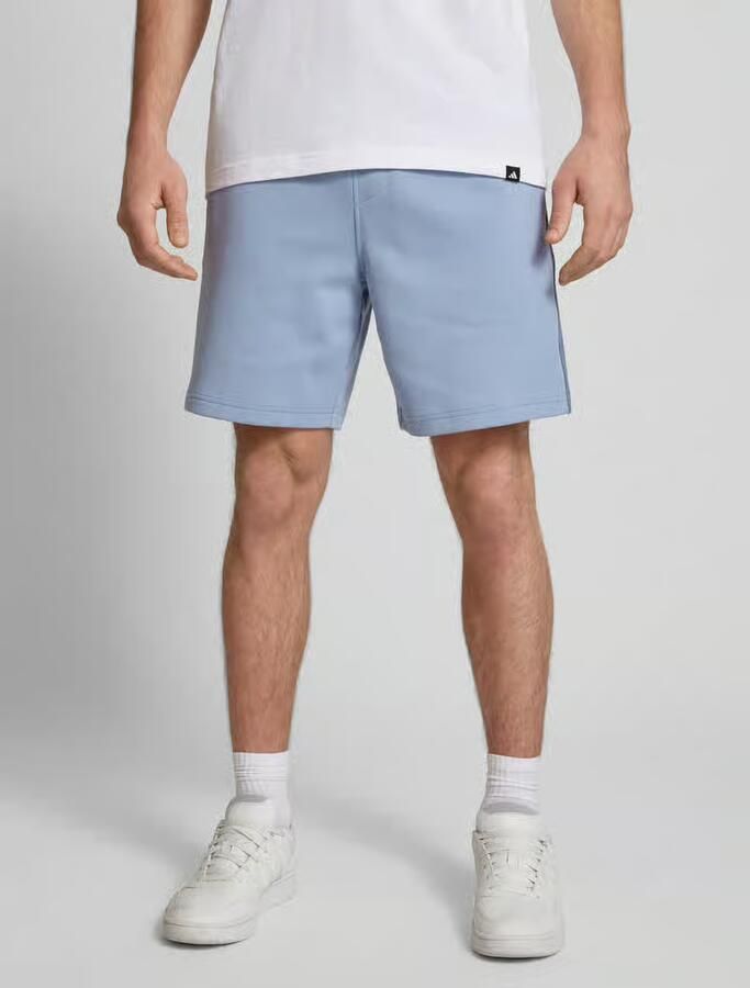 Calvin Klein Jeans Regular fit korte broek met gestileerde opening - Foto 2