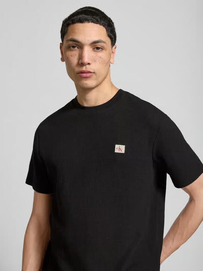 Calvin Klein Jeans Regular Fit T-shirt met logo-patch - Foto 2