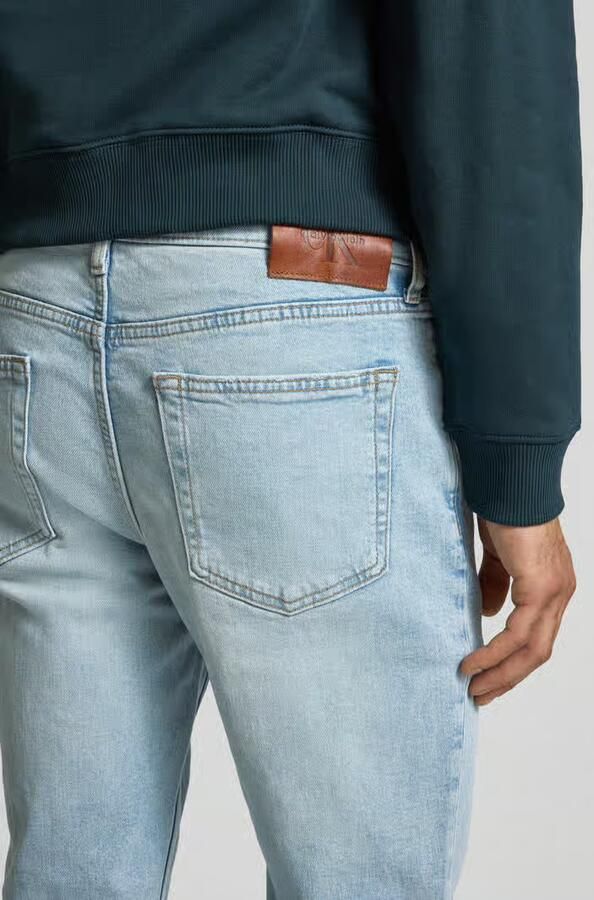 Calvin Klein Jeans Slim fit jeans in used-look met labeldetail - Foto 12