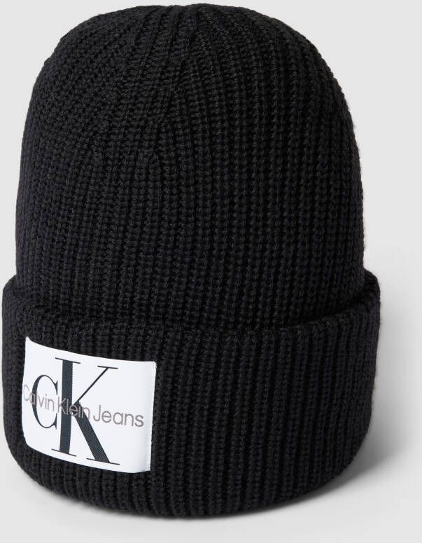Calvin Klein Noirs. Stijlvolle en warme muts Black Unisex