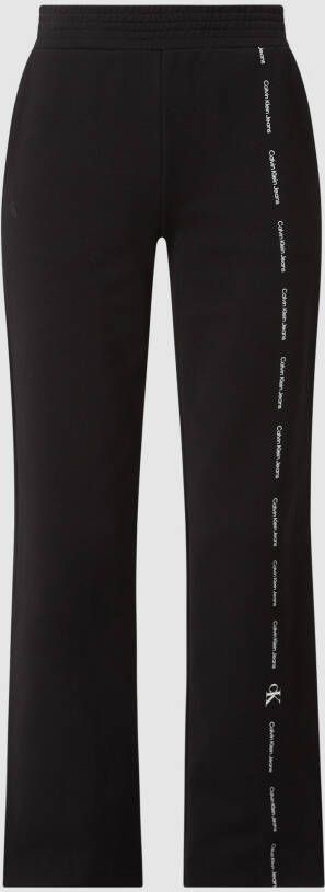 Calvin Klein Sweatpants REPEAT LOGO JOGGERPANTS met jeans logo tape