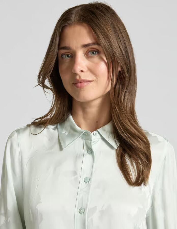 Calvin Klein Womenswear Blouse van viscose met afgeronde zoom