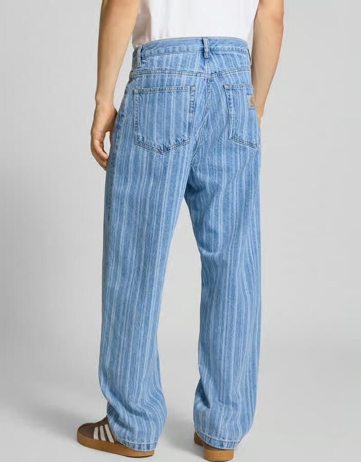 Carhartt Work In Progress Loose fit jeans met all-over print model 'Rylan'