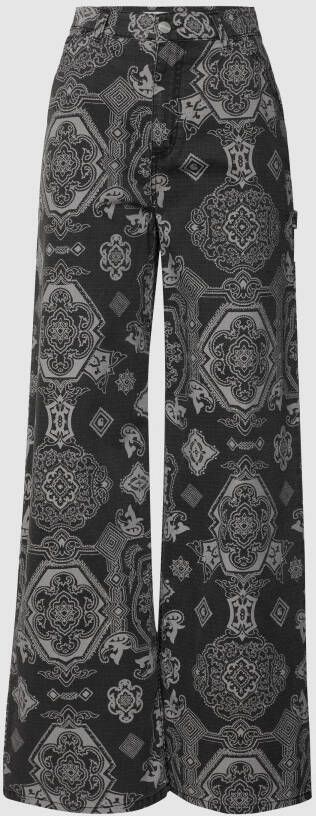 Carhartt Work In Progress Flared jeans met all-over motief
