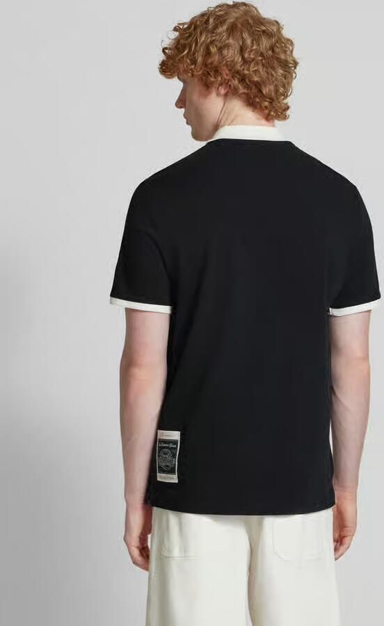 Champion Poloshirt met labelstitching
