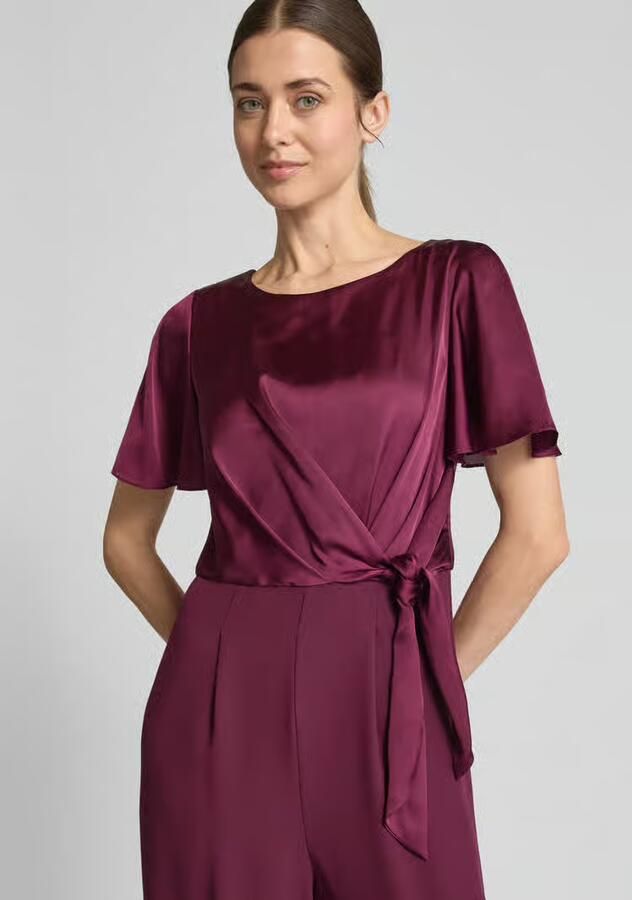 Christian Berg Cocktail Jumpsuit met strikceintuur