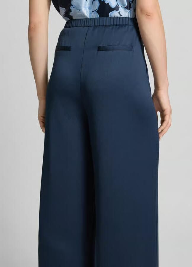 Christian Berg Cocktail loose fit pants met elastische tailleband en steekzakken