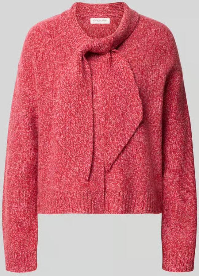 Christian Berg Woman Gebreide pullover van wol met strik