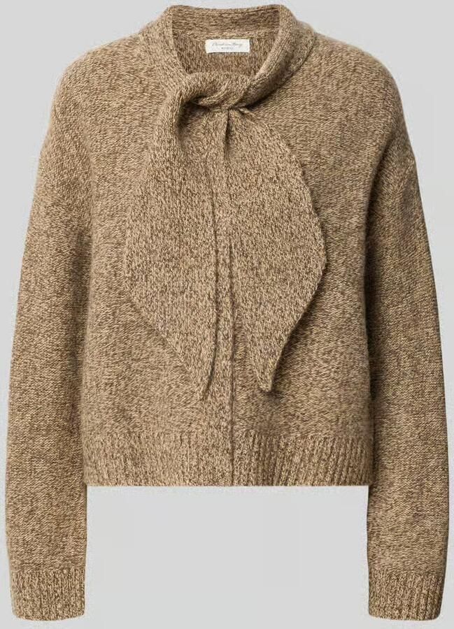 Christian Berg Woman Gebreide pullover van wol met strik