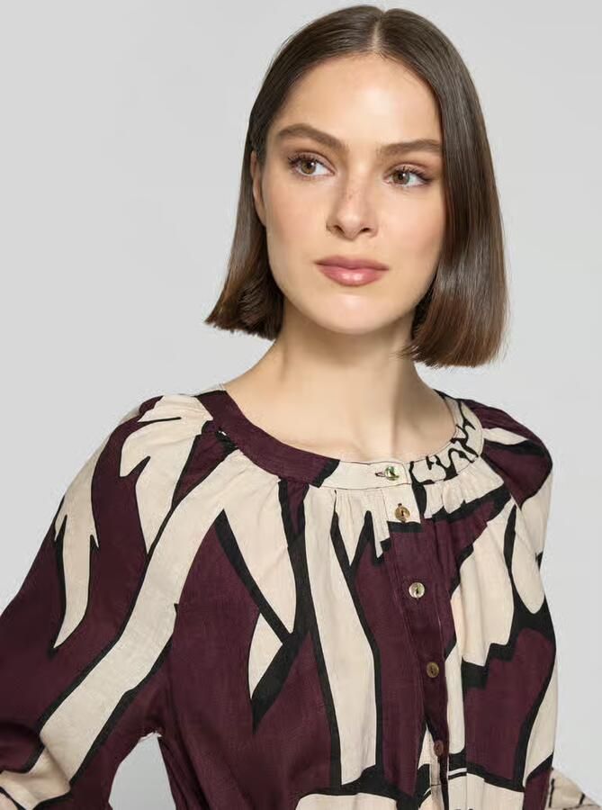 Christian Berg Woman midi-jurk van puur linnen met all-over bloemenmotief