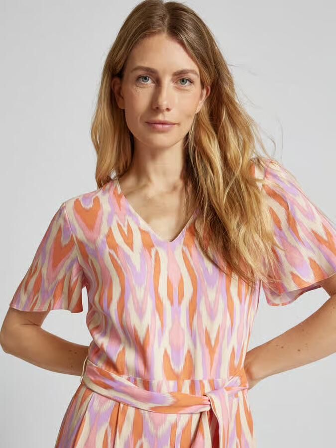 Comma Jumpsuit van viscose met all-over motief en strikceintuur