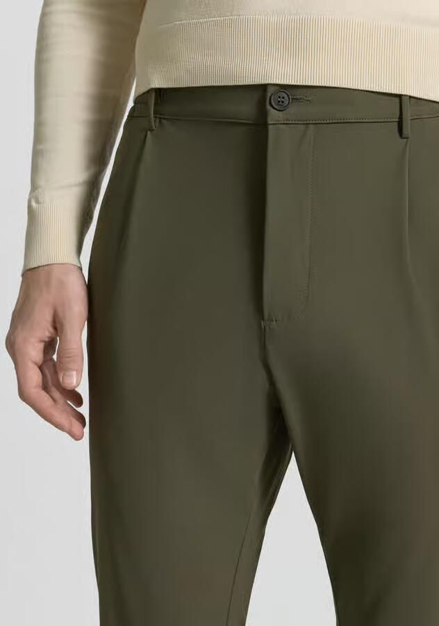 Cruna slim fit broek met paspelzakken op het zitvlak