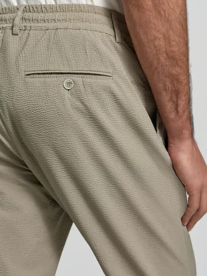 CRUNA Stoffen slim fit broek met structuurpatroon - Foto 2