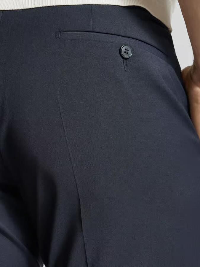 Digel slim fit pantalon van scheerwolmix met paspelzakken achter model 'Apollo'