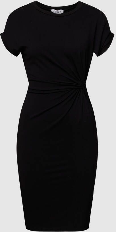 EDITED Knielange jerseyjurk met knoopdetail model 'Faith'