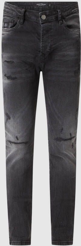 ELIAS RUMELIS Tapered fit jeans in used-look