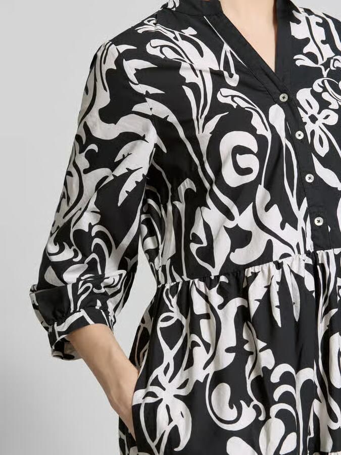 Emily Van den Bergh Midijurk met steekzakken en 3 4-mouw