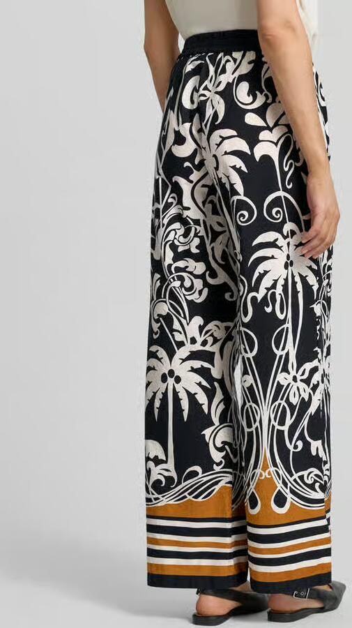 Emily Van den Bergh wide fit stoffen broek met all-over bloemenmotief