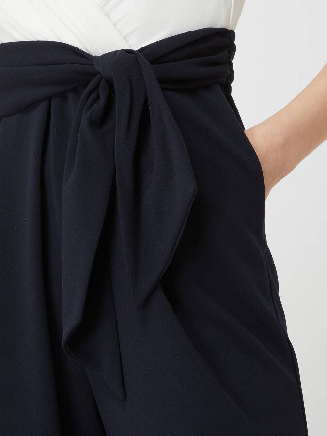 Christian Berg Cocktail Tweekleurige jumpsuit van chiffon