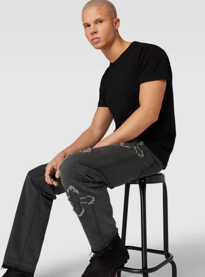 Karl Kani Jeans in destroyed-look met labelstitching