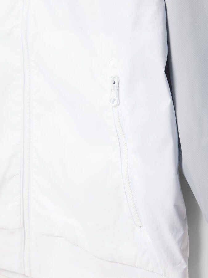 Nike Sportswear Windrunner ruimvallend jongensjack op heuplengte met capuchon Wit