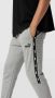 PUMA PERFORMANCE Sweatpants met labeldetail model 'ESS+ Tape Sweatpants' - Thumbnail 3