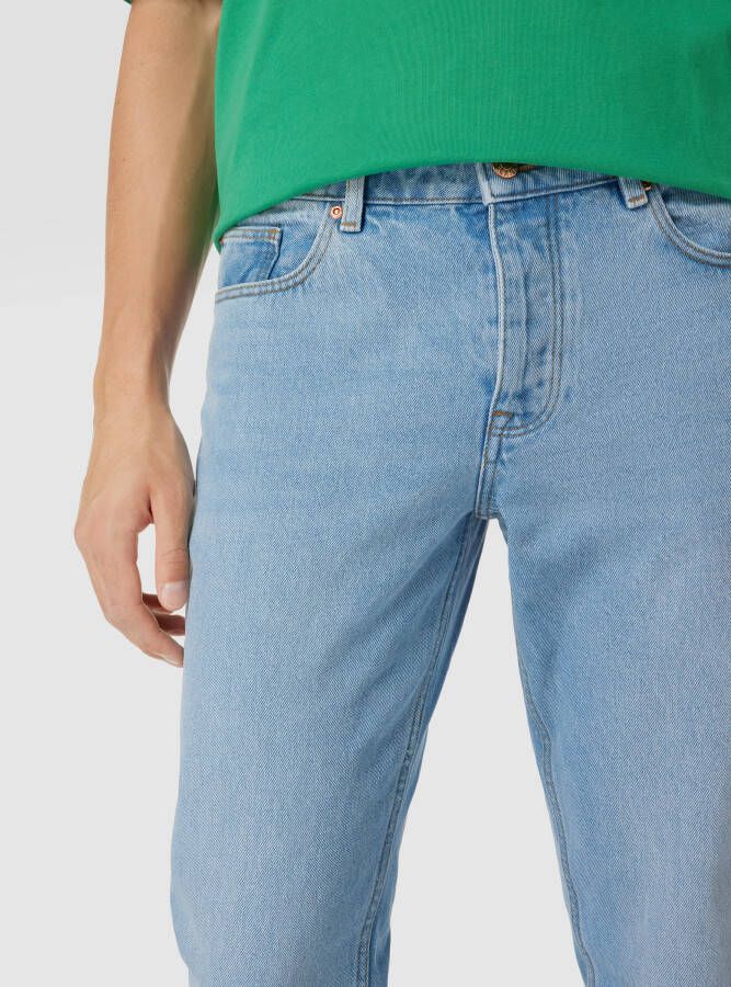 REVIEW Mid rise jeans met slim fit