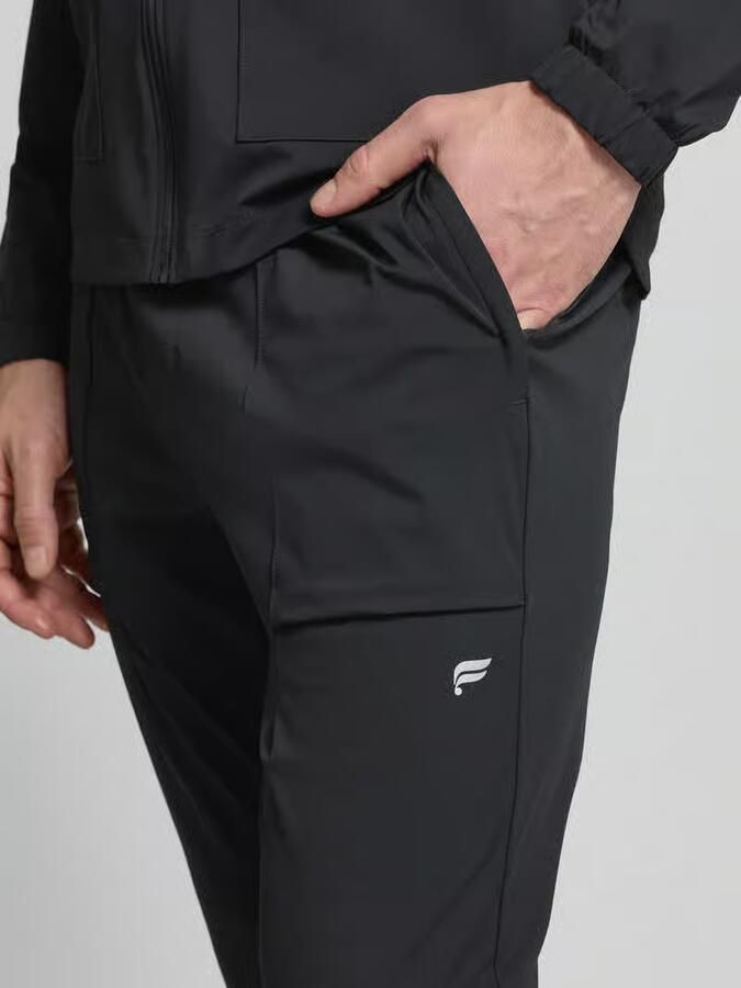 Fabletics Slim Fit joggingbroek met logoprint - Foto 2