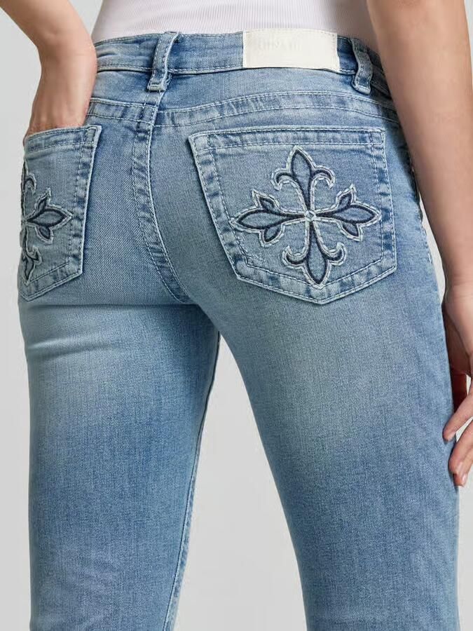 Gina Tricot Flared jeans in used-look model 'Poppy'