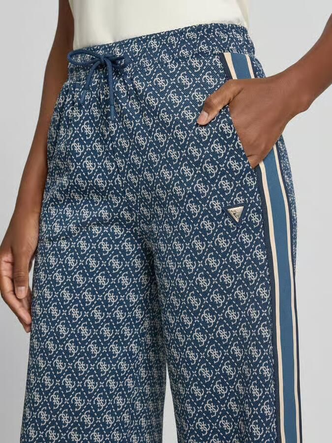 GUESS Activewear sweatpants met logomotief in all-over look